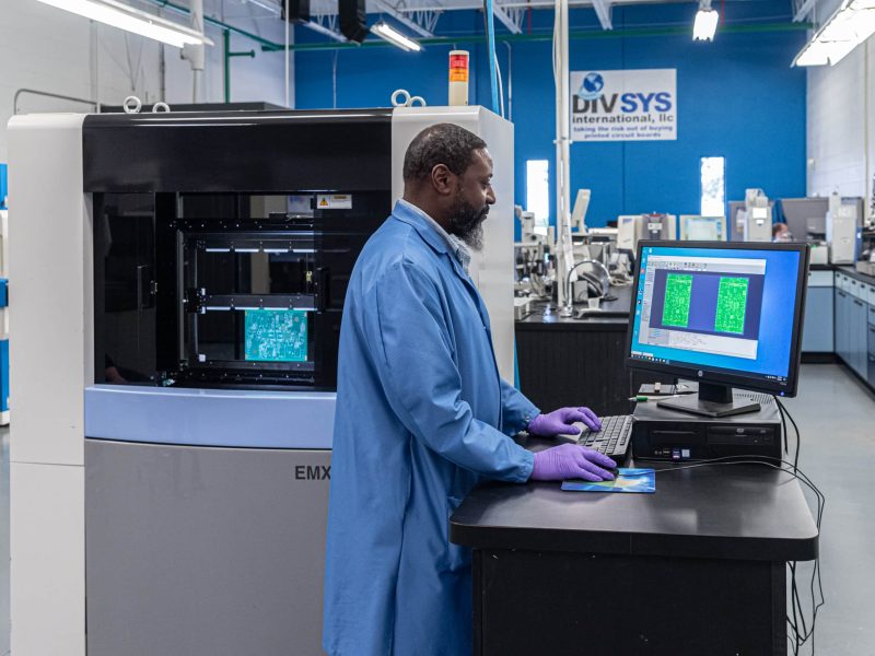 Receive expert testing during the Indianapolis PCB Manufacturing process image shows DIVSYS technician at work