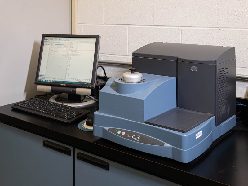 DIVSYS offers many lab capabilities for Indianapolis PCB Manufacturing image shows machine equipment and monitor