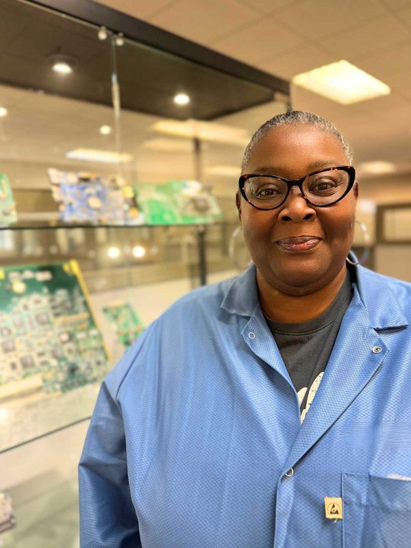 Soldering Team Leader Ormesha Linton of DIVSYS, a team of experts in Indianapolis PCBA Manufacturing